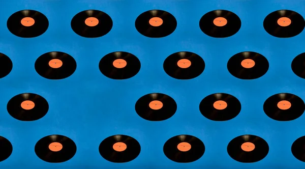 青い背景にビニールレコードのコラージュ — ストック写真