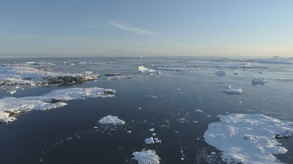 Arctic Polar Open Water Glacier Aerial View. Ice Melt in Winter Ocean Water Surface Flight Drone Above Overview. Antarctica Climate Change Concept