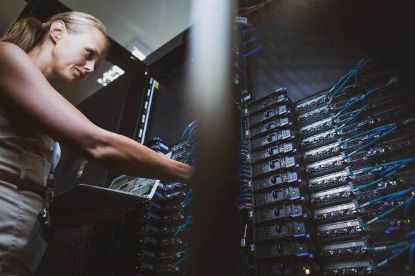 Engineer Standing Working Server Racks Doing Routine Maintenance Check Diagnostics — Stock Photo, Image