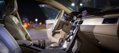 Modern car interior (shallow DOF - selective focus; color toned image) clipart