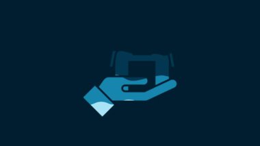 White Farm house in hand icon isolated on blue background. 4K Video motion graphic animation.