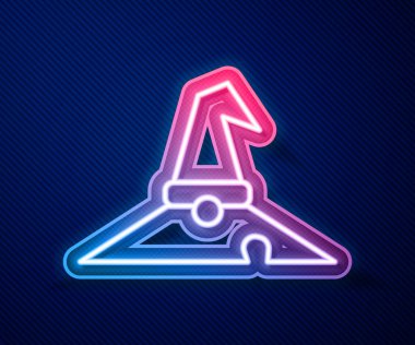 Parlayan neon hattı cadı şapkası simgesi mavi arkaplanda izole edildi. Mutlu Cadılar Bayramı Partisi. Vektör.