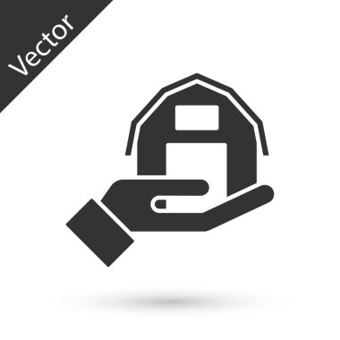 Grey Farm house in hand icon isolated on white background.  Vector.
