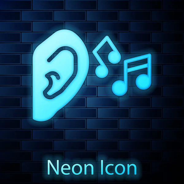Leuchtende Neon Ohr Hören Tonsignal Symbol Isoliert Auf Backsteinwand Hintergrund — Stockvektor