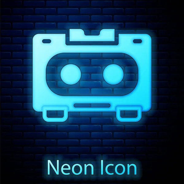 Świecący Neon Retro Audio Kaseta Magnetofonowa Ikona Izolowana Tle Cegły — Wektor stockowy