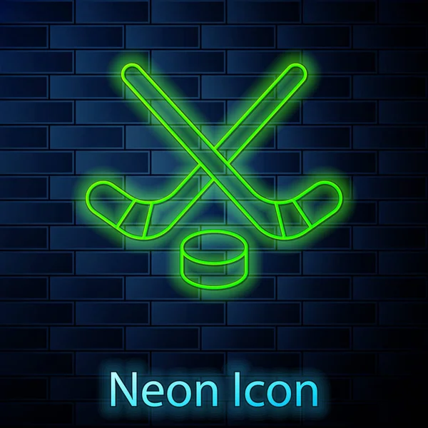 Glowing Neon Line Ice Hockey Sticks Puck Icon Isolated Brick — Stock Vector