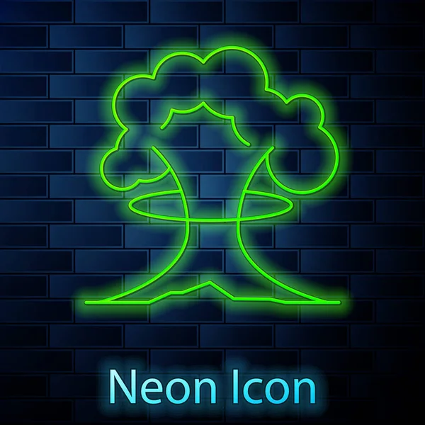 Glowing Neon Line Nuclear Explosion Icon Isolated Brick Wall Background — Stock vektor