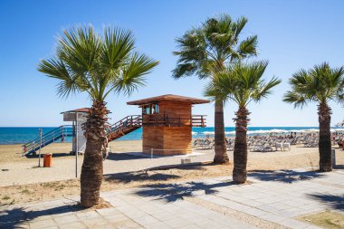 Larnaca, Cyprus - September 26, 2022: Lifeguard tower on a beach called Mackenzie in Larnaca city clipart
