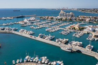 Limassol, Cyprus - September 28, 2022: Drone aerial photo of blue flag New Marina of Limassol clipart