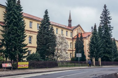 Frydlant nad Ostravici, Czech Republic - April 17, 2018: Nursing home care and chapel in Frydlant nad Ostravici city clipart