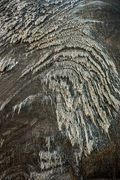 Salt on the wall in Rudolf mine, Salina Turda salt mine in Turda city, Romania