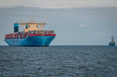 Gdansk, Poland - August 21, 2013: MS Maersk Mc-Kinney Moller Triple E-class, former worlds largest container ship in port of Gdansk city clipart