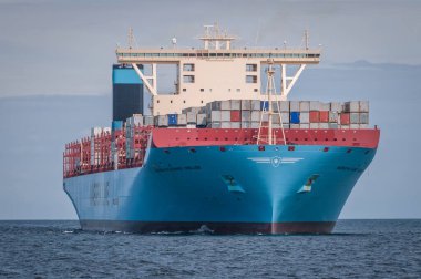 Gdansk, Poland - August 21, 2013: MS Maersk Mc-Kinney Moller Triple E-class, former worlds largest container ship in port of Gdansk city clipart