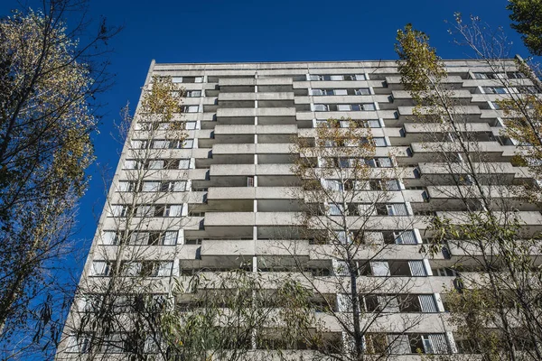 Facade of 16-story residential building in Pripyat ghost city in Chernobyl Exclusion Zone, Ukraine