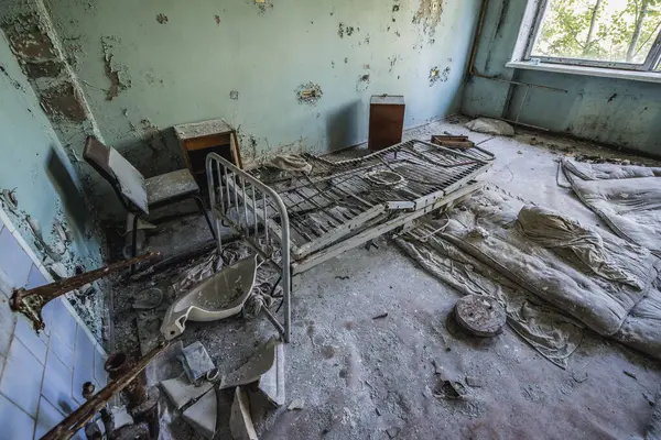 Patient room in maternity ward of hospital MsCh-126 in Pripyat ghost city in Chernobyl Exclusion Zone, Ukraine