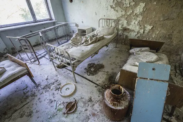 Patient room in maternity ward of hospital MsCh-126 in Pripyat ghost city in Chernobyl Exclusion Zone, Ukraine