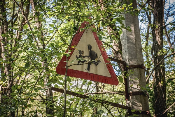 Children crossing sign in Pripyat ghost city in Chernobyl Exclusion Zone, Ukraine