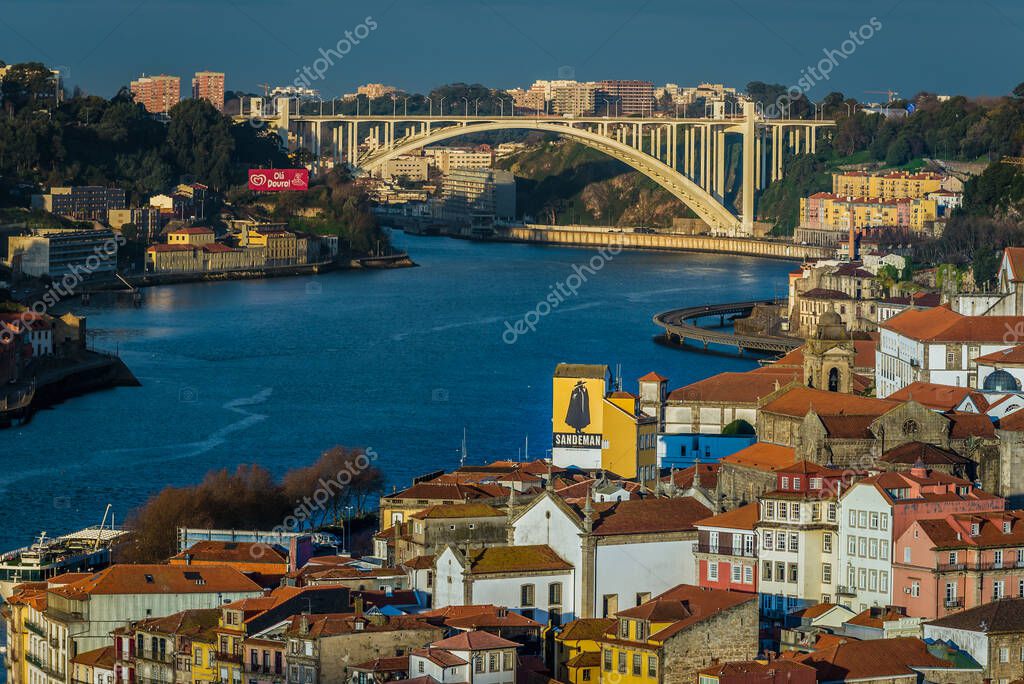 Porto, Portugal - December 10, 2016: Porto city and Arrabida Bridge over Douro River, view from Vila Nova de Gaia city