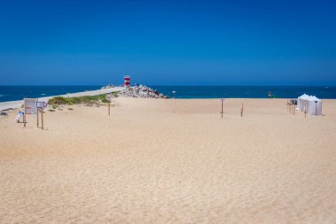Nazare, Portugal - July 8, 2021: Nazare Beach in Nazare town on so called Silver Coast, Oeste region of Portugal clipart