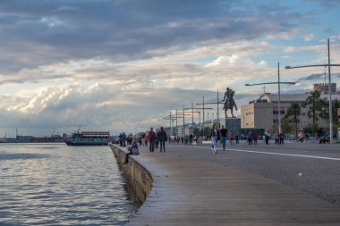 Thessaloniki, Greece - October 11, 2021: Waterfront with Equestrian statue of Alexander the Great in Alexander the Great Garden, Thessaloniki city, Greece clipart