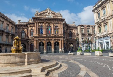 Catania, Italy - September 26, 2021: Teatro Massimo Bellini opera house on Vincenzo Bellini Square in historic part of Catania city on the island of Sicily, Italy clipart