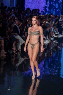 A model walks the runway for Cirone Swimwear Fashion Show during Art, Hearts, Fashion Swim Week at the Faena Forum in Miami Beach on 7- 11- 2021