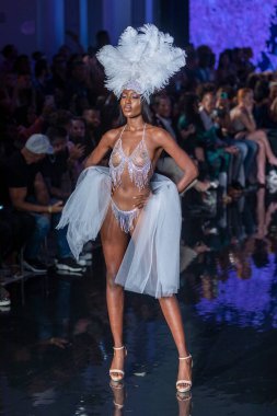 A model walks the runway for Cirone Swimwear Fashion Show during Art, Hearts, Fashion Swim Week at the Faena Forum in Miami Beach on 7- 11- 2021