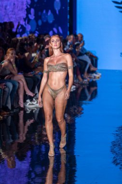 A model walks the runway for Cirone Swimwear Fashion Show during Art, Hearts, Fashion Swim Week at the Faena Forum in Miami Beach on 7- 11- 2021