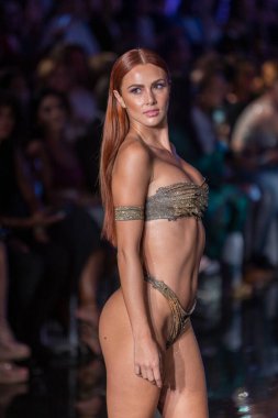 A model walks the runway for Cirone Swimwear Fashion Show during Art, Hearts, Fashion Swim Week at the Faena Forum in Miami Beach on 7- 11- 2021