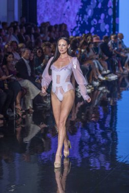 A model walks the runway for Cirone Swimwear Fashion Show during Art, Hearts, Fashion Swim Week at the Faena Forum in Miami Beach on 7- 11- 2021