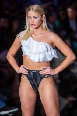 A model walks the runway for Cirone Swimwear Fashion Show during Art, Hearts, Fashion Swim Week at the Faena Forum in Miami Beach on 7- 11- 2021