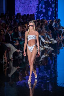 A model walks the runway for Cirone Swimwear Fashion Show during Art, Hearts, Fashion Swim Week at the Faena Forum in Miami Beach on 7- 11- 2021