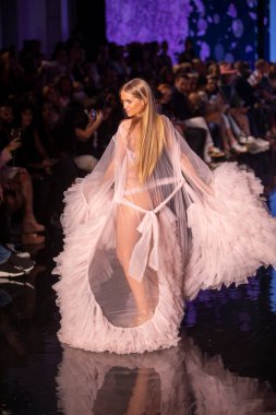 A model walks the runway for Cirone Swimwear Fashion Show during Art, Hearts, Fashion Swim Week at the Faena Forum in Miami Beach on 7- 11- 2021