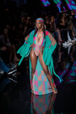 A model walks the runway for Aude Fashion Show during Art, Hearts, Fashion Swim Week at the Faena Forum in Miami Beach on 7- 11- 2021