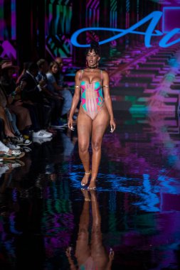 A model walks the runway for Aude Fashion Show during Art, Hearts, Fashion Swim Week at the Faena Forum in Miami Beach on 7- 11- 2021