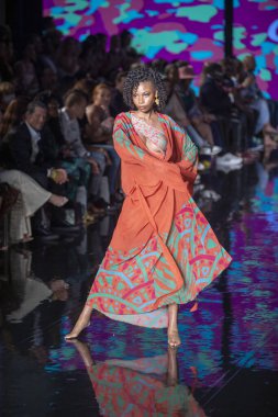 A model walks the runway for Aude Fashion Show during Art, Hearts, Fashion Swim Week at the Faena Forum in Miami Beach on 7- 11- 2021