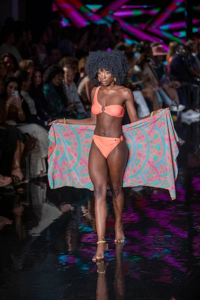 A model walks the runway for Aude Fashion Show during Art, Hearts, Fashion Swim Week at the Faena Forum in Miami Beach on 7- 11- 2021
