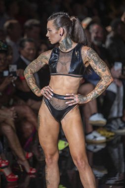 A model walks the runway for Bikini Beach Australia Fashion Show during Art, Hearts, Fashion Swim Week at the Faena Forum in Miami Beach on 7- 11- 2021