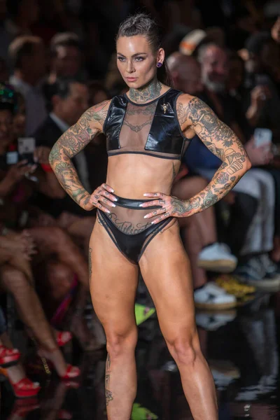 A model walks the runway for Bikini Beach Australia Fashion Show during Art, Hearts, Fashion Swim Week at the Faena Forum in Miami Beach on 7- 11- 2021
