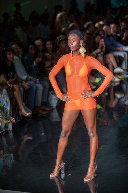 A model walks the runway for Bikini Beach Australia Fashion Show during Art, Hearts, Fashion Swim Week at the Faena Forum in Miami Beach on 7- 11- 2021