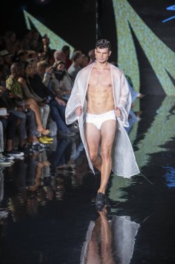 A model walks the runway for the House of Skye Sexy Black Bra Fashion Show during Art, Hearts, Fashion Swim Week at the Faena Forum in Miami Beach on 7- 11- 2021