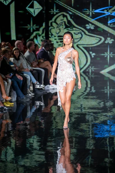A model walks the runway for the House of Skye Sexy Black Bra Fashion Show during Art, Hearts, Fashion Swim Week at the Faena Forum in Miami Beach on 7- 11- 2021