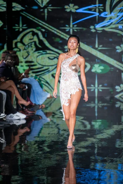 A model walks the runway for the House of Skye Sexy Black Bra Fashion Show during Art, Hearts, Fashion Swim Week at the Faena Forum in Miami Beach on 7- 11- 2021