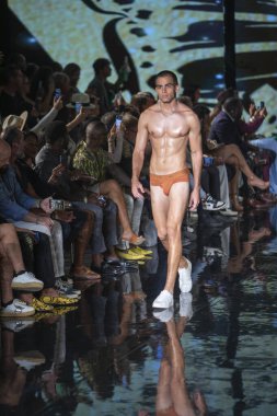 A model walks the runway for the House of Skye Sexy Black Bra Fashion Show during Art, Hearts, Fashion Swim Week at the Faena Forum in Miami Beach on 7- 11- 2021