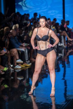 A model walks the runway for the House of Skye Sexy Black Bra Fashion Show during Art, Hearts, Fashion Swim Week at the Faena Forum in Miami Beach on 7- 11- 2021