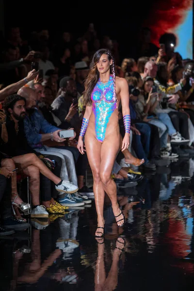 A model walks the runway for the Black Tape Project Fashion Show during Art, Hearts, Fashion Swim Week at the Faena Forum in Miami Beach on 7- 11- 2021