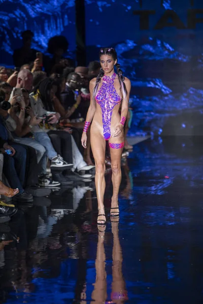 A model walks the runway for the Black Tape Project Fashion Show during Art, Hearts, Fashion Swim Week at the Faena Forum in Miami Beach on 7- 11- 2021