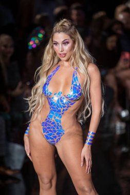 A model walks the runway for the Black Tape Project Fashion Show during Art, Hearts, Fashion Swim Week at the Faena Forum in Miami Beach on 7- 11- 2021