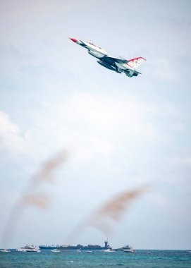 U.S. Air Force Thunderbirds squadron performs during the Fort Lauderdale Air Show at Fort Lauderdale Beach, FL on May 12th, 2024 clipart