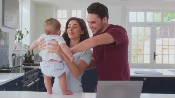 Tracking Shot Loving Transgender Couple Playing Baby Son Standing Counter — Stock Video